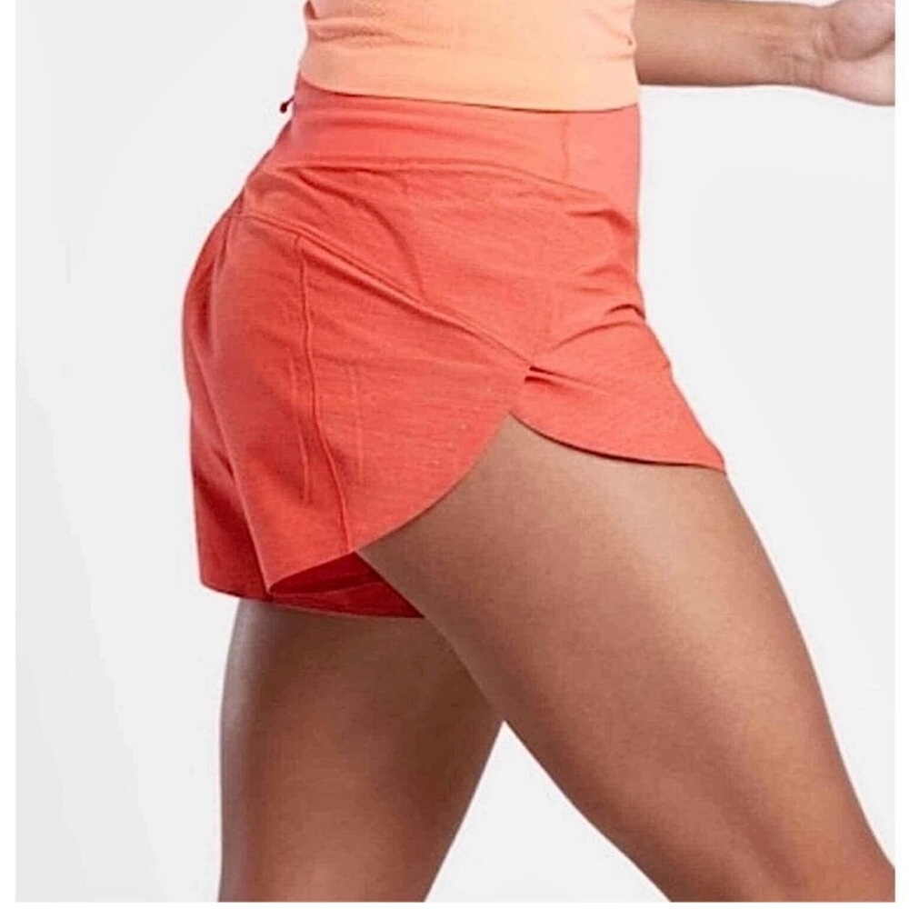 Athleta Orange Athletic Shorts with Asymmetrical‎ Hem